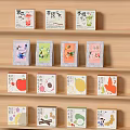Tea Product Packaging Decorative Set with Fruit Themed Colorful Boxes and Bags on Wooden Shelf
