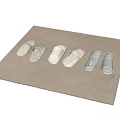 Comfy Soft Slippers In Various Styles Placed On Beige Textured Mat 3d model