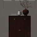 Modern Wooden Entryway Side Cabinet with Golden Handles Decorative Books White Candle Holder and Vase