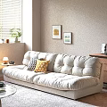 Beige Double Sofa with Geometric and Yellow Pillows Near Wall Art and Table Lamp