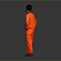 Man in orange spacesuit standing with hands on hips against dark background with NASA logo