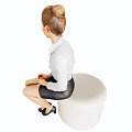A Woman In White Shirt Black Leather Skirt Sitting On White Round Stool With Heels