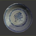 Intricate Carved Ceramic Bowl With Blue And White Floral Patterns Design