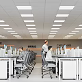 Front Desk Reception with Two Receptionists on Laptops Textured Wall Logo and Pendant Lights