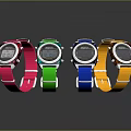 Four Colorful Digital Watches With Pink Green Blue Yellow Straps And Modern Design
