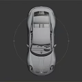 Blue Sports Car With Modern Sleek Body Design And Shiny Alloy Wheels On Reflective Surface