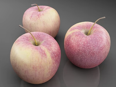 Three Fresh Apples with Pink and White Skin on a Smooth Gray Surface Looking Juicy 3d model