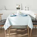 Bright Sunlit Minimalist Dining Room With Natural Wood Chairs And Soft Light Blue Tablecloth