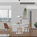 Warm Modern Dining And Living Space With Round Table Wooden Chairs And Soft Ambient Lighting