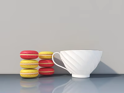 White Ceramic Cup With Stacked Red And Yellow Macarons On Smooth Gray Surface 3d model