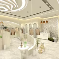 Stylish Clothing Store With White Interior Mannequins Hanging Clothes And Plants