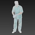 A Man In Green Surgical Scrubs Wearing Surgical Cap Face Mask And White Gloves Standing