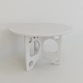 Round White Dining Table With Hollow Circular And Oval Leg Designs In Simple Modern Style
