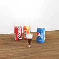 Three Branded Carbonated Soda Cans with Glass of Dark Drink on Wooden Table