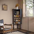 Decorative Black Cabinet With Ornate Patterned Panels Vase Flowers Armchair Floor Lamp Wall Art