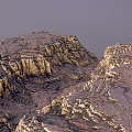 Rugged Mountain Landscape With Rocky Cliffs Sunlit Peaks And Natural Terrain Views