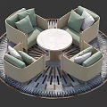 Beige Sofa Set With Light Green Cushions And Round Coffee Table On Geometric Rug