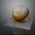 Display of Orange Sphere With Maps and Text on Gray Square Platform