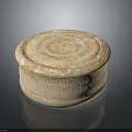 Beige Round Covered Ceramic Box With Textured Surface And Ornate Design 3d model