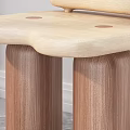 Cream Colored Single Chair with Layered Wooden Backrest and Dark Cylindrical Legs