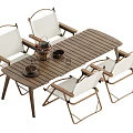 Modern Outdoor Table And Chair Set With Wooden Tabletop Metal Frame And White Cushioned Chairs