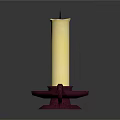 Decorative Yellow Wax Candle Placed On Red Candle Holder With Small Handle