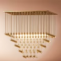 Elegant Golden Chandelier with Hanging Chains and Crystal Decorations Illuminated