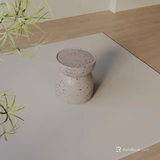 Minimalist Light Colored Side Table With Speckled Texture And Green Plant Accent 3d model