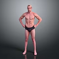Muscular Shirtless Man Standing With Hands On Hips In Black Swim Trunks Against Gray Background