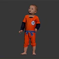 Man In Orange Jumpsuit With Blue Belt And Logo Standing Barefoot On Black Background