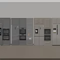 Modern Kitchen Interior With Gray And Beige Cabinets Refrigerators Ovens And Appliances