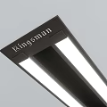 Clothes Hangers with Hanging Garments and Overhead Linear Lights in White Minimalist Space