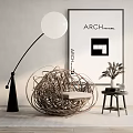 Woven Sphere Accent Chair With White Floor Lamp Side Table Dried Plants And Architectural Poster