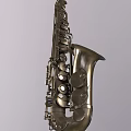 Elegant Brass Saxophone Musical Instrument Featuring Shiny Metal Body And Detailed Key Design