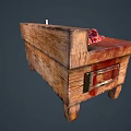 Wooden Chest Displaying Red Substance On Top And Candle By Decorative Drawers