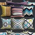 Colorful Geometric Pattern Throw Pillows With Vibrant Yellow Brown Pink Blue Tones