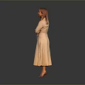 Woman In Light Pink Dress Standing With Arms Crossed Against Gray Background