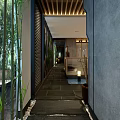 Chinese Style Restaurant Interior With Circular Arch Long Dining Table Water Feature And Wooden Decor