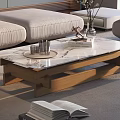 Marble and Black Glass Coffee Table with Wooden Frame and Books Glasses in Living Room