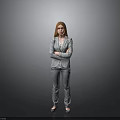 Professional Woman in Gray Suit Standing with Arms Crossed Against Gray Background