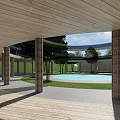 Circular Homestay Building Surrounded by Green Lawn and Trees With Central Courtyard and Water Feature
