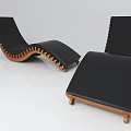 Modern Lounge Chair with Black Cushion and Wooden Curved Design for Comfortable Relaxation