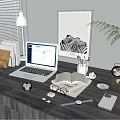 Organized Home Office Desk Setup With Laptop Open Book Globe And Plant