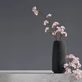Minimalist Black Vase With Pink Cherry Blossoms On Gray Tabletop And Simple Background