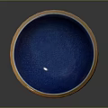 Artistic Hand Carved Ceramic Bowl With Blue Interior And Brown Rim