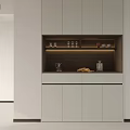 Modern Sideboard with Light Cabinet Doors and Glassware on Dark Countertop with Kettle and Fruits