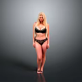 Blonde Woman in Black Lingerie Posing Full Length Against Gray Studio Background