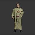 Man Wearing Green Kimono With Red Belt Standing With Hands On Chest Against Gray Background