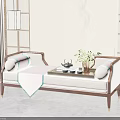 Chinese Style Daybed With Beige Upholstery Wooden Frame Cushions Tea Set Green Plant And Decorative Wall