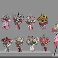 Various Colorful Flower Bouquets Displayed On Shelves And Tripod Stand